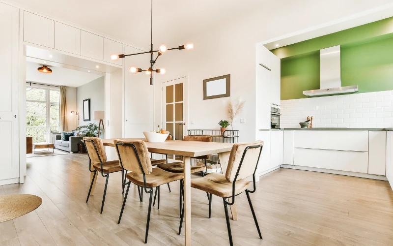 Modern open plan dining room and kitchen with minimalist interior design