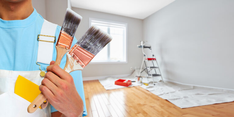 Painter,Hand,With,Painting,Brush